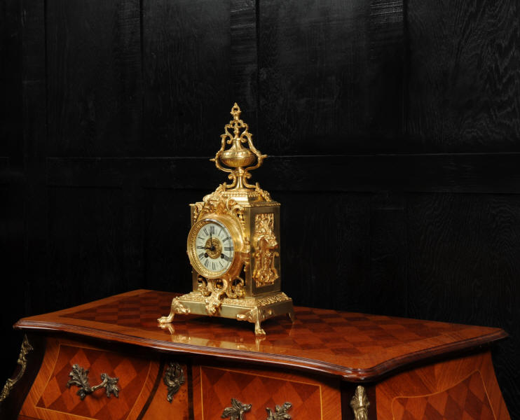 Antique French Gilt Bronze Clock With Lions Masks by Mougin